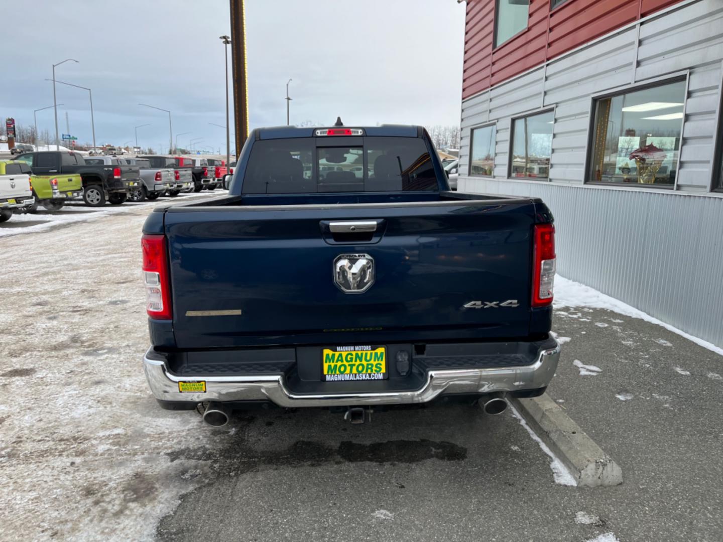 2020 Blue RAM 1500 Big Horn Quad Cab 4WD (1C6SRFBT3LN) with an 5.7L V8 engine, 8A transmission, located at 1960 Industrial Drive, Wasilla, 99654, (907) 274-2277, 61.573475, -149.400146 - Photo#4